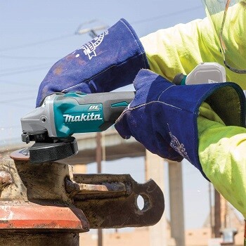 using cordless grinder to grind metal