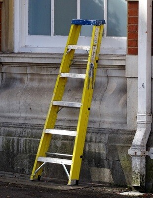 step ladders against window